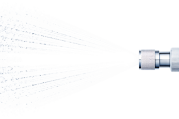 Metallic nozzle spraying water stream isolated on a transparent background liquid