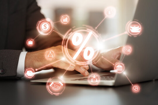 Man using laptop at table, closeup. Virtual scheme with percent sign and icons