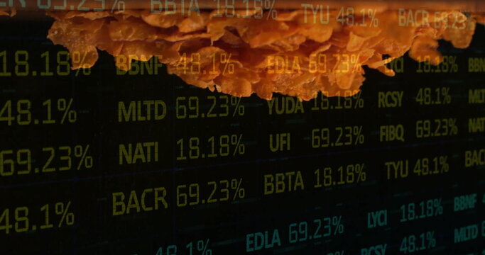 Hovering crispy fried chicken fillet over stock ticker screen, combining fast food and finance - Powered by Adobe
