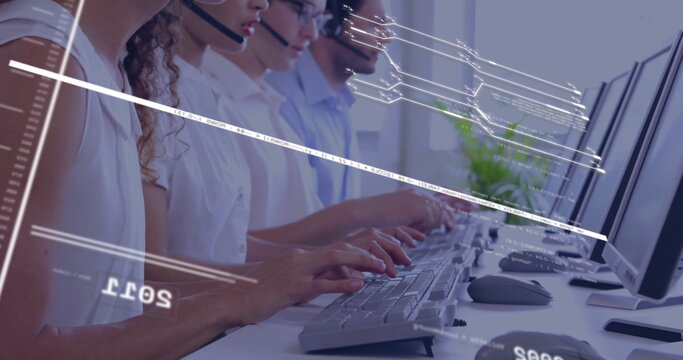 Typing support team wearing business attire providing help at modern call center, with headsets