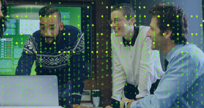 Leaning team in office using laptop, displaying binary code overlay with monitors and coffee cup