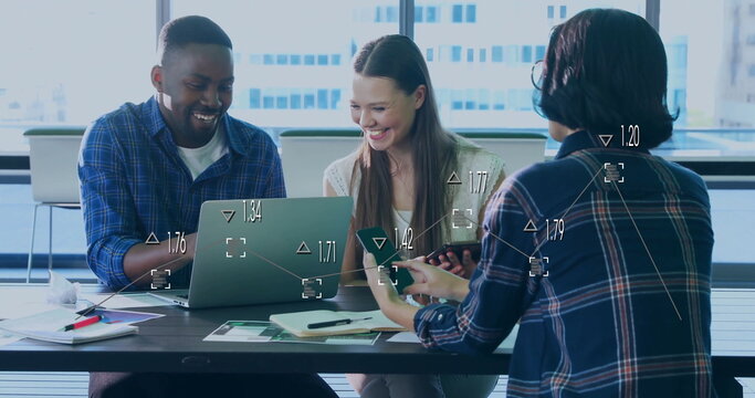 Working team analyzing data in meeting room, with laptop, smartphone, documents, notepad and pens
