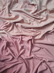 fabric is a material commonly used for clothing whose color has been damaged and faded