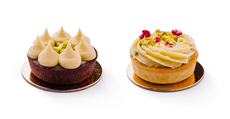Decadent desserts featuring pistachio and cream toppings on elegant bases