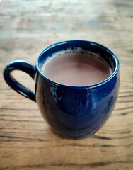 Hot Chocolate Coffee in a cup on a wooden table