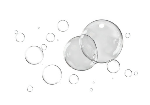 Transparent soap bubbles floating and reflecting light, isolated on transparent background