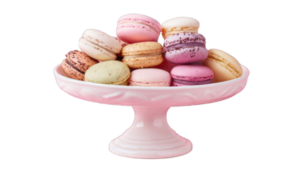 Pretty pastel macarons on a pink pedestal dish