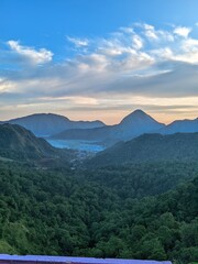 Fototapeta premium Tropical Mountain Landscape with Valley and Blue Sky at Sunset