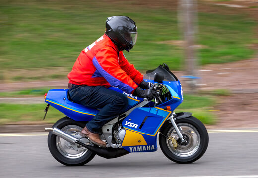 Milton Keynes,Bucks,UK - Aug 3rd 2025:  Yamaha YSR 50 miniature  motorcycle travelling on a British road