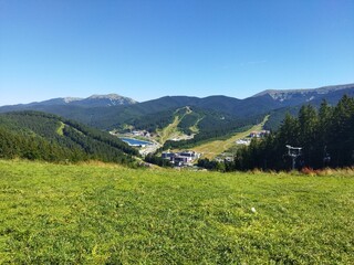 Bukovel, Carpathians: Panoramic view of Bukovel resort. Summer rest. Bukovel in sunny summer day. Carpathian Mountains, Ukraine.