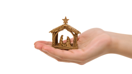 Hand holding miniature wooden nativity scene with mary, joseph, and baby jesus isolated on the transparent background