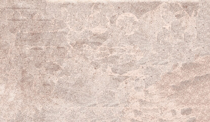 Beige grunge textured wall creating abstract background