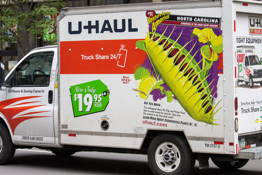 Quebec, Canada, 05 July 2025 : Colorful moving truck advertises carnivorous plants from North Carolina Uhaul fleet