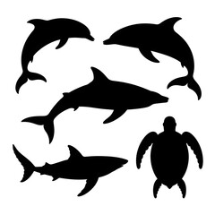 Fototapeta premium Dynamic silhouettes of dolphins, a shark, and a sea turtle gracefully swimming in the ocean