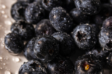 Rinsed blueberries in bowl of water