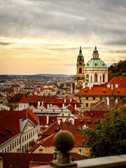 Red roofs and Cathedral of the old town of Prague in autumn.