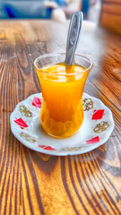 tangerine flavored tea on wooden table