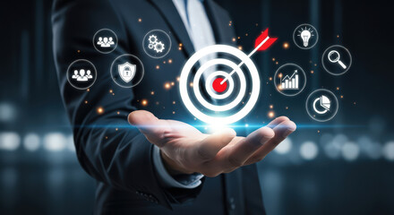 Business Goals and Objectives A Conceptual Image of a Hand Holding a Target with an Arrow Surrounded by Business and Strategy Related Icons
