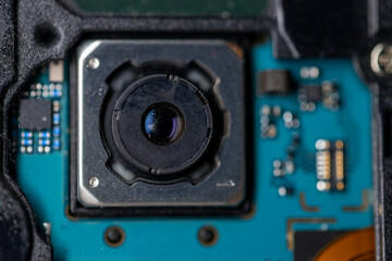 Camera lens mounted on back of camera, ready to capture