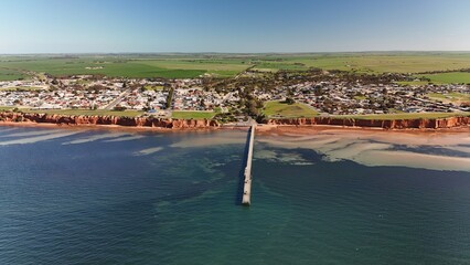 Ardrossan, Yorke Peninsula, South Australia: Aerial Drone View of Coastal Red Cliffs, Jetty, Sandy...
