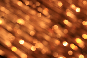 Festive gold background with bokeh effect