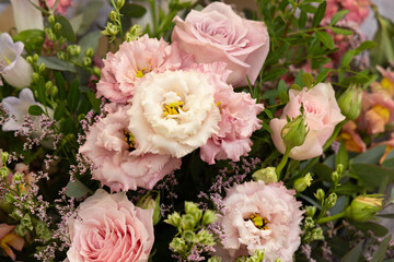 Beautiful bouquet featuring pink roses and lisianthus, creating a romantic and elegant arrangement perfect for celebrations and gifts