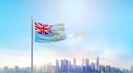 Tuvalu national flag waving with skyline and buildings. Tuvalu national flag for independence day.