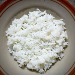 Steaming White Rice Bowl: Simple and Delicious Meal, A Bowl of White Rice, Ready to Eat and Serve