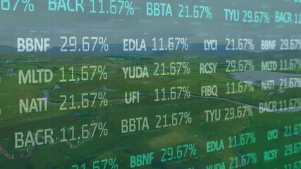 Alphanumeric codes appearing over farmland updating percentages rearranging and showing live data