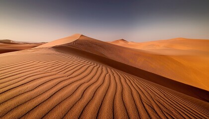 cascading sand dunes subtle ochre tones fluid lines create a grounded pristine form textured surface ample negative space