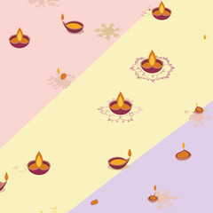 Diwali diyas, or oil lamps, displayed on a multicolored background with decorative patterns.