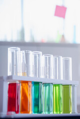 Vertical Horizon Science laboratory chemistry test science lab with microscope glass tubes on white table scientific background. Vertical Colorful Liquid biology scientist laboratory chemical fluid