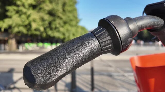 Close-up shot of bicycle handlebars with grips and controls