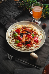 Pasta with sauce in large portions