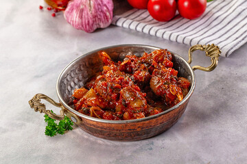 Roasted chicken hearts with vegetables
