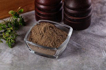 Ground dry black pepper powder