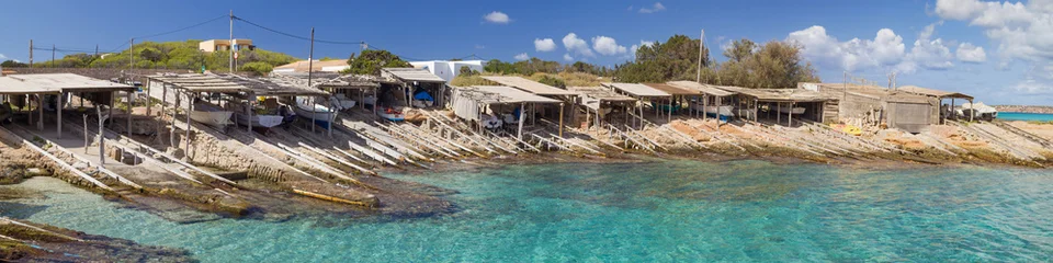 Traditional Boathouses at Es Calo de Sant Agusti © Santi Rodríguez