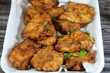 Fried Epinephelus fish fillet, Epinephelus is a genus of marine ray-finned fish, groupers from the subfamily Epinephelinae, part of the family Serranidae, seafood cuisine