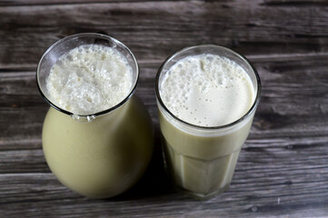 A Sugarcane juice mixed with Sobia, the liquid extracted from pressed sugarcane, obtained by crushing peeled sugar cane in a mill, Sobis or Subia prepared from a mixture of coconut, rice, and milk