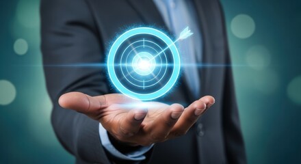Businessman holding a glowing futuristic target interface in his palm