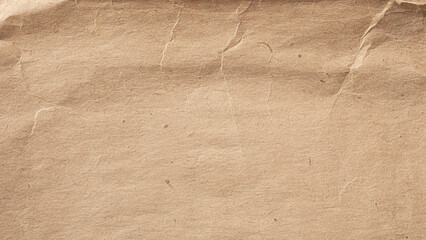 Textured packaging paper features rustic look with crinkles. Grunge texture background.