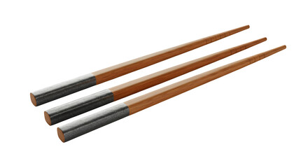 Fototapeta premium Brown wooden chopsticks with metallic tips display texture and grain on a black backdrop, ideal for food product staging and restaurant posters.