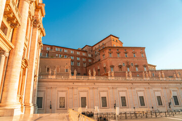 Fototapeta na wymiar Palace building in Vatican City at golden hour light