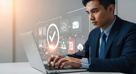 Businessman working on laptop with digital interface and success checkmark
