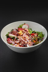 Salad with sauce in a large serving