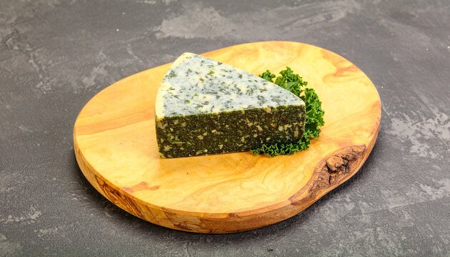 Yarg (England, Cornwall)
A semi-hard cow&rsquo;s milk cheese wrapped in nettle leaves, forming a mottled green and silver rind around a lemony, crumbly interior. 