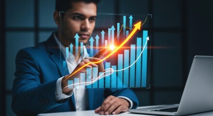 Businessman analyzing upward trending financial growth chart with laptop