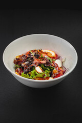 Salad with sauce in a large serving