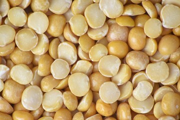 Macro image of yellow split peas.