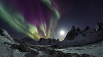 Naklejka premium The breathtaking display of the northern lights over majestic mountain ranges.